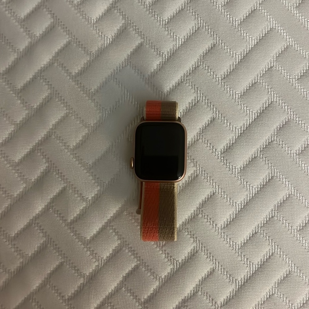 rose gold Apple Watch SE